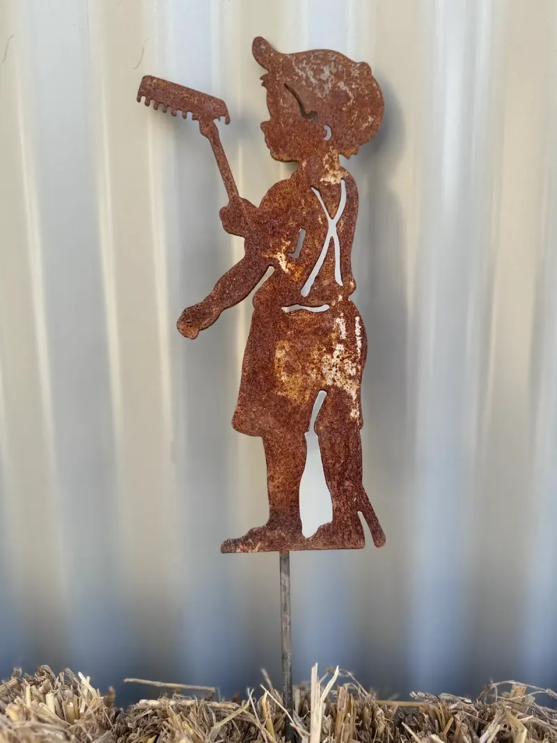 Boy with Rake Australian Corten steel garden stake by Rock DeSigns